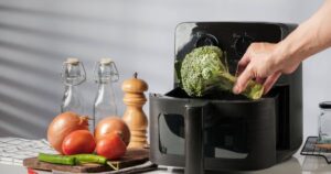 0_Placing-Fresh-Broccoli-into-Air-Fryer.jpg