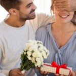 2_Loving-man-with-flowers-closing-eyes-of-woman-making-surprise.jpg