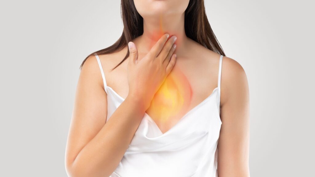 2dab3mg-woman-suffering-acid-reflux-948835119.jpg