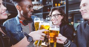3_Friends-toasting-with-beer-in-a-pub.jpg