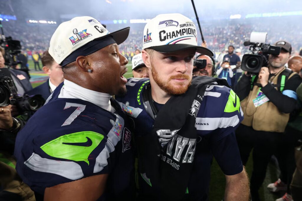 Sam-Darnold-and-Uchenna-Nwosu-of-the-Seattle-Seahawks-celebrate.jpeg
