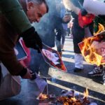 protesters-burn-pictures-iranian-supreme-1055855272.webp.jpeg